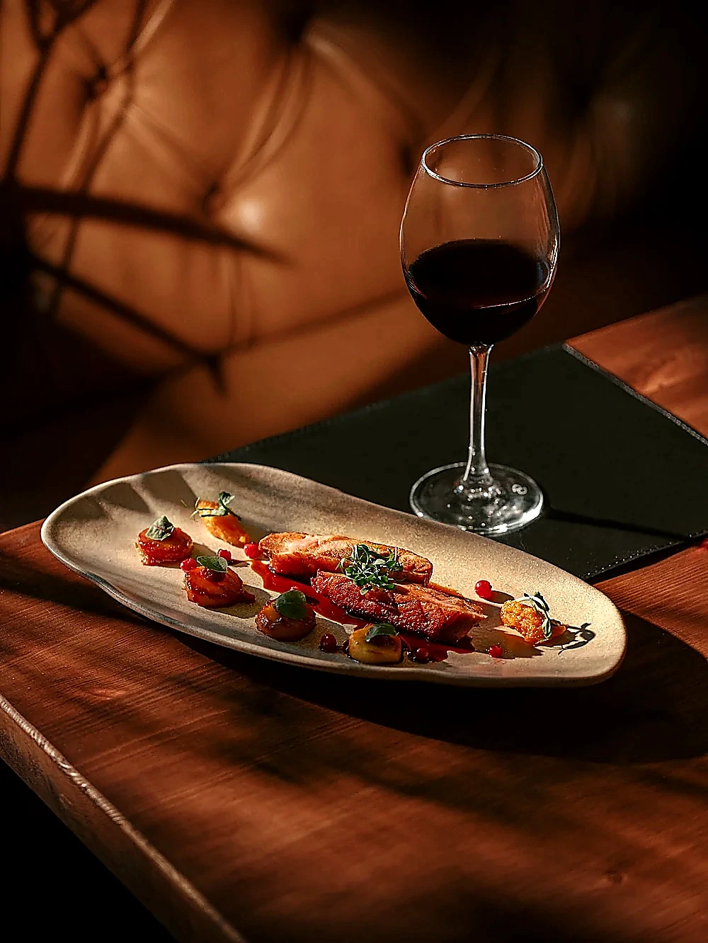 Plated dish with wine at G SNAIL